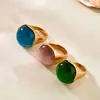 Anillo Minimalista Elegante Ovalado con Piedra Ojo de Gato Estilo Ins Europeo y Americano, Joyería de Moda con Personalidad de Lujo Ligero, Acero Inoxidable Chapado en Oro Real de 18K