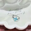 Nueva colección de serie de proteína azul de pendientes de acero de titanio médico, elegantes y versátiles, con diseños de trébol de cuatro hojas y cruz