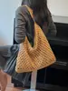 Bolsa de Palha Casual de Grande Capacidade para Mulheres 2026 Novo Estilo Bolsa de Ombro Vazada Estilo Preguiçoso Fashionável Elegante Bolsa de Praia para Férias