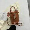 Bolsa de cubo de moda de verano al por mayor de fábrica para mujer, nuevo bolso de hombro, bolso de mano popular transfronterizo