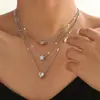 Comercio exterior transfronterizo superventas moda simple multicapa estrella de cinco puntas corazón gota de agua colgante collar apilado retro 1