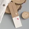 Etiquetas de papel kraft de diseño antiguo, etiquetas personalizadas de algodón y lino para ropa Hanfu, etiquetas gruesas de papel especial hechas a medida