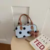Bolso cruzado, otoño 2026, bolso de mano de lunares, bolso de trabajo para mujer, diseño versátil, nueva versión coreana, bolso de bolos de nicho