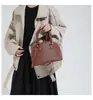 Bolsa Pequena para Mulheres 2026 Nova Moda Retrô Bolsa de Mão Formato Concha Bolsa Simples Casual de Ombro Transversal Bolsa Feminina Tendência