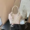 Bolso de mano de lunares estilo coreano transfronterizo para mujer, nuevo popular versátil de otoño 2026 para hombro y bandolera