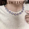 Collar de flor de esmalte azul exquisito versátil de moda retro ins europeo y americano con una cadena para la clavícula de sensación de lujo ligero y alta gama
