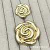 Botones metálicos de moda con forma de rosa para trajes, abrigos de lana tejidos y otras prendas; botones decorativos simples y versátiles, cosidos a mano