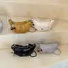 Bolsa de corrente versátil estilo dumpling, nova moda 2026, nicho feminino transfronteiriço, bolsa transversal e de ombro super popular