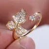 Vendedor Caliente Transfronterizo Anillo Abierto de Hoja de Arce Completamente Incrustado de Diamantes Lujo Ligero Estilo Coreano Sentido de Diseño Nicho Anillo de Hoja Chapado en Oro Zirconia