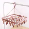 Percha plegable de 32 clips para calcetines de bebé, de plástico, para adultos y niños, resistente al viento, para colgar en el hogar.