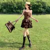 Atuendo de Viaje al Gran Noroeste de Xinjiang Estilo Bohemio Verano Estilo Desértico Muy Bonita Falda Corta Ceñida a la Cintura