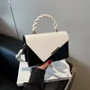 Moda textura cor combinação nova 2025 cor contrastante primavera casual simples estilo estrangeiro bolsa transversal pequena quadrada para mulheres