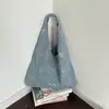 2026 Verano Nuevo Bolso Cubo Casual de Mezclilla Bolso de Hombro de Moda y Único Tendencia Diseño de Nicho Bolso para Mujer