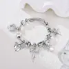 2026 Panjia Nuevo Producto Diseño Transfronterizo Más Vendido Exquisito Lentejuela Lazo Flor Pequeña Colgante Pulsera de Cuentas DIY