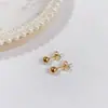 Aretes de Tuerca Geométricos de Estrella de Acero Titanio con Bolas de Acero Grandes y Pequeñas de Moda Simple al por Mayor de Fábrica de Venta Caliente Aretes Perforados Mujeres
