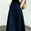 2026 Otoño Temprano Nueva Falda Azul Marino de Corte A para Mujer para Viajar Cintura Alta Adelgazante Cubre Caderas Caída Media Longitud Falda de Paraguas