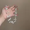 Elegante y estilizado collar de perlas estrelladas para mujer, nueva colección 2026, una cadena de clavícula popular y de alta gama, un collar ligero y versátil