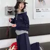 Conjunto Deportivo para Niñas 2026 Otoño Nuevo Falso Dos Piezas Sudadera con Capucha Bordada Letra Pantalones de Pierna Ancha Conjunto de Dos Piezas Moderno