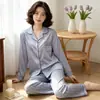 Pijama francés reductor de edad para mujer, nuevo para primavera y otoño, simple, con puntos de ola, manga larga, pantalones de seda helada, ropa de casa, traje de moda, venta al por mayor