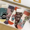 Calcetines mujer otoño e invierno nuevos calcetines de tubo de dibujos animados calcetines de panda lindos calcetines de algodón para dama fabricantes venta al por mayor