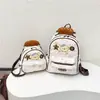 Mochila altamente estilosa e versátil com tema de urso, bolsa escolar estilo faculdade de grande capacidade transfronteiriça 2026 para meninas