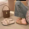 Otoño e invierno versátiles de lino, nuevas zapatillas planas de moda, sandalias de playa de moda con hebilla retro para mujer 2026