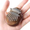 Madera maciza 8 tonos mini Kalimba piano de pulgar pequeño ocho tonos piano de dedo Kalimba kalimba instrumentos musicales venta al por mayor transfronteriza