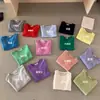 Contém 100% lã! Blusa de tricô feminina Guangzhou Thirteen Lines MIS*2026 Primavera/Verão com decote redondo, modelagem slim e manga curta, que reduz a idade