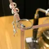 Anillo de diseño con forma de serpiente plateada espíritu de serpiente femenina serpiente pequeña nicho todo-partido personalidad viento frío anillo abierto joyería todo-partido