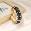 Bestseller transfronteiriço na Europa e América: Pulseira de design irregular em blocos de cores esmaltadas retrô criativas com design de bambu ondulado boêmio
