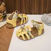 Sandalias de Diadema Tejida Estilo Mori para Niñas 2026 Nuevo Verano Zapatos de Princesa Huecos con Lazo para Niña Pequeña Zapatos de Playa