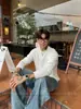 Suéter de punto negro de cuello alto medio estilo Old Money para hombre, versión coreana de invierno, top de capa interior cálido de alta gama