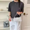 Bolsa de Bolinhas de Nicho Super Popular de Alta Qualidade para Mulheres 2026 Novo Estilo Moda Versátil Transversal Pequena Quadrada de Mão Bolsa de Bolinho