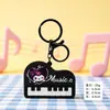 Llavero creativo de violonchelo en colores macaron, pequeño colgante para bolsos de niñas, accesorios culturales y creativos, pequeños artículos para regalo