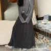 ¡Lunares estilo coreano! Falda de paraguas de línea A de longitud media para otoño 2026 para mujer, disimula el abdomen y estiliza la figura