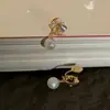 [Leyenda de la Sirena] Guirnalda de Fantasía Aretes de Perla de Sirena Súper Hada Frescos y Dulces Repelente de Mosquitos Clip para Oreja