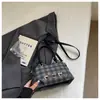 Bolso de mujer lindo de nicho súper popular 2026 nueva moda bolso cruzado versátil bolso de mano mini exquisito bolso tipo cubo