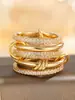 Producto Nuevo Más Vendido Transfronterizo Anillo Doble Grueso de Cobre Dorado de 18 Quilates Apilado con Circonita Cúbica de Cinco Anillos Alto Brillo