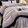 Juego de ropa de cama de cuatro piezas estilo francés de lujo ligero, bordado de alto gramaje en terciopelo de leche, amigable con la piel, cálido, franela engrosada, artículos para dormitorio