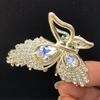 Clip de mariposa de lazo de diamante flash mediano, temperamento de alta gama, clip para el cabello de media coleta, clip de tiburón para la parte posterior de la cabeza, horquilla de diamantes de imitación