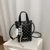 Bolso de mano nuevo de lunares, bolso para teléfono estampado, bolso de nicho estilo coreano, bolso de hombro de moda para el día a día para niñas, bolso cruzado