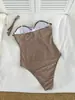 Bikini de una pieza sexy con estampado de cuadros de encaje estilo europeo y americano 2026, corte ajustado, espalda descubierta, tirantes desmontables para mujer