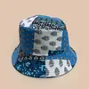 Nuevo Sombrero de Pescador Estilo Étnico con Empalme de Flores y Hojas para Hombres y Mujeres Sombrilla Retro para Viaje Sombrero de Cubeta Doble Cara Venta al por Mayor