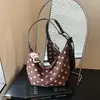 Bolso tipo empanada retro de nicho transfronterizo, nuevo bolso cruzado de moda para mujer Otoño 2026 con lunares, bolso de hombro para el trabajo