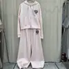 Traje Deportivo de Primavera y Verano para Mujer 2025 Nuevo Sudadera con Capucha y Bordado Conjunto de Dos Piezas Delgado Moderno