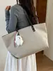 Bolso grande de mujer transfronterizo, nuevo bolso de hombro de moda otoño 2026, bolso tote texturizado casual para commuting de nicho