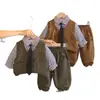 Moda Atacado Roupas para Meninos 2026 Cor Sólida Gravata Colete de Trabalho Camisa Listrada Roupa de Manga Longa Conjunto de Três Peças Infantil