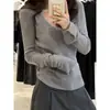 Tejido de punto gris coreano para mujer, diseño nuevo de principios de primavera de 2025, top ajustado de manga larga, camiseta interior de cuello bajo