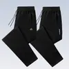 Calça esportiva masculina de outono, grossa, com elasticidade em quatro direções, zíper lateral, múltiplos bolsos, cintura alta elástica, perna reta solta.