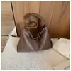 Bolso popular de un hombro para mujer, gran capacidad, estilo nuevo 2026, versátil, bandolera de un hombro, textura de moda, bolso tipo cubo simple
